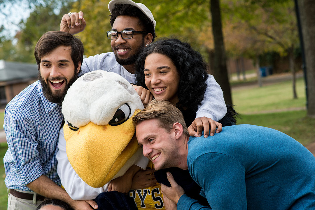 SMCM student scholars and Solomon the Seahawk