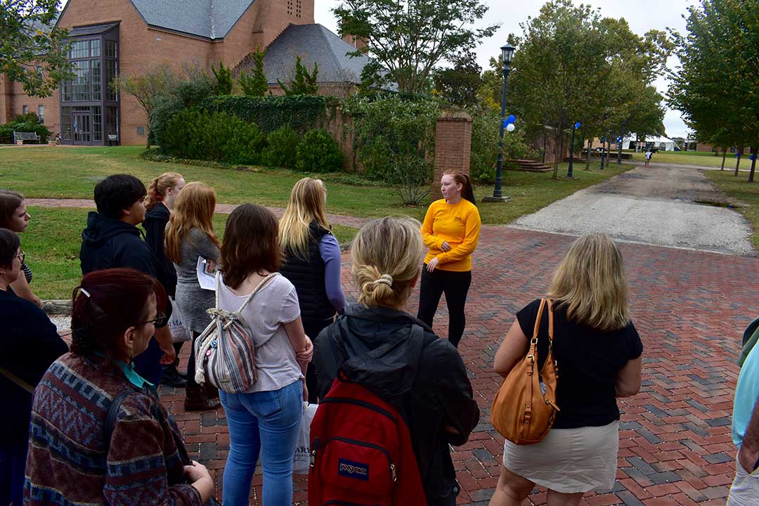 Prospective students explore campus with a student tour guide.