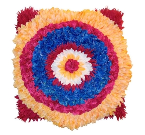 Colorful faux-flower artwork in a circular design