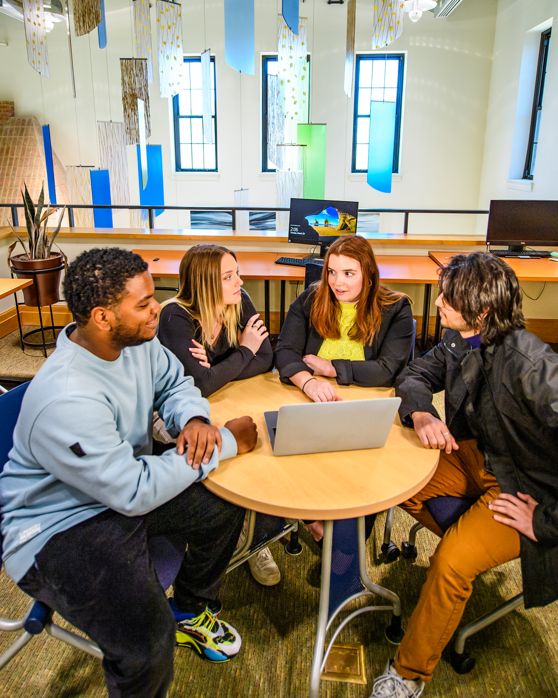 Photo of students getting help from a peer mentor in the Career Studio at St. Mary's College of Maryland