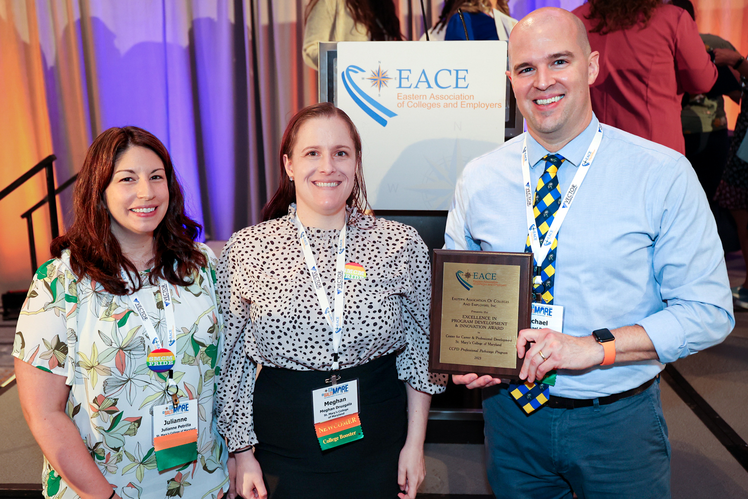 Staff receiving an award at the annual conference of the Eastern Association of Colleges and Employers