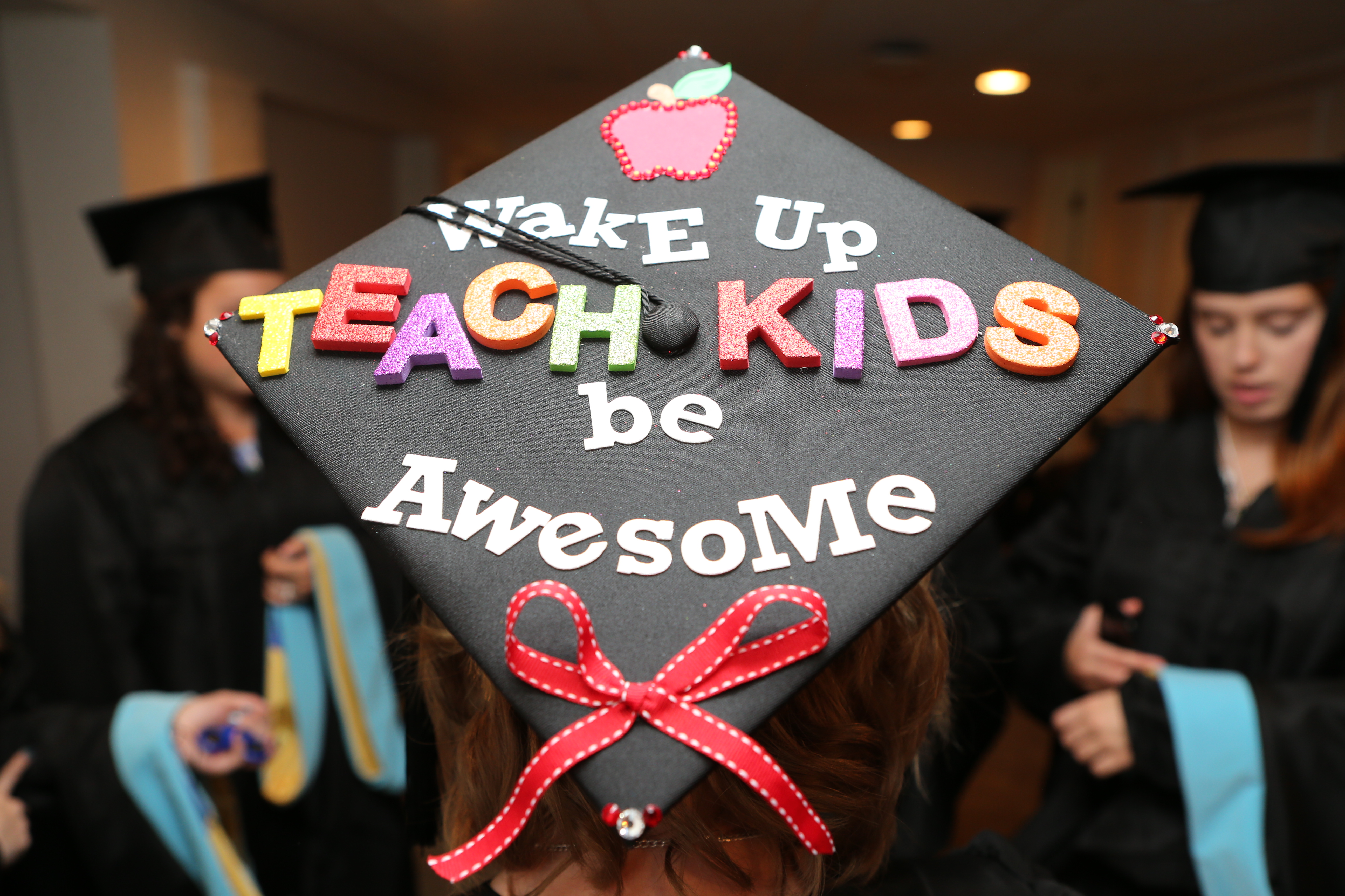 an image of a student's graduation cap with the following words attached on top: 