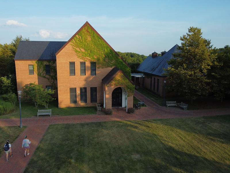 Shot of Glendening Hall a brick building with a blue sky backdrop